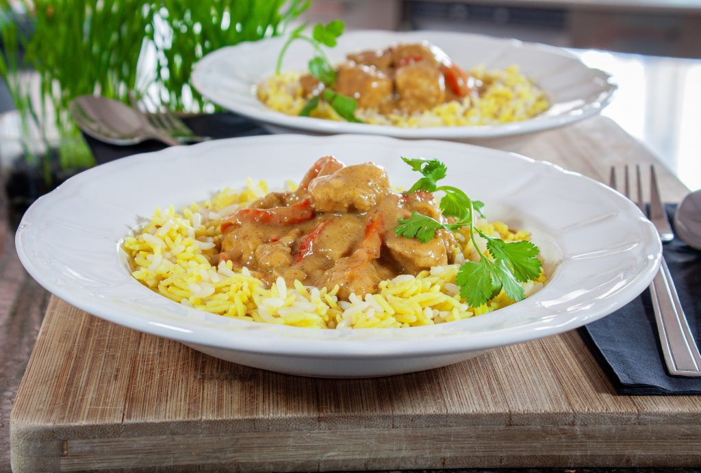 Creamy Chicken Curry on a bowl of rice