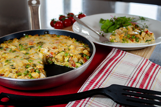 A Spanish omelette on plate ready to be served