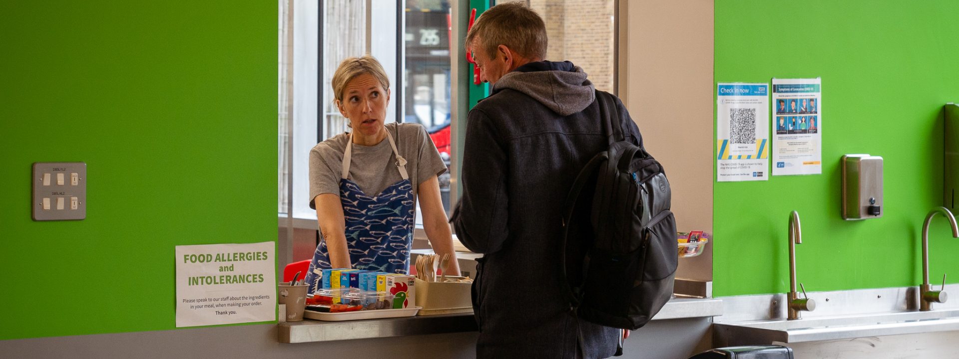 Man ordering food at Nourish Hub